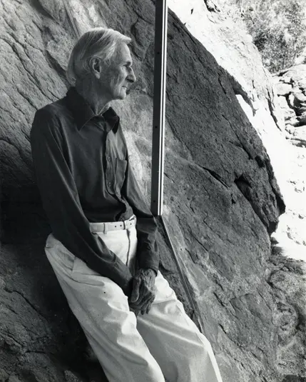 Albert Frey in Frey House 2, leaning against the rock inside the house, Palm Springs, Calif., circa 1995.