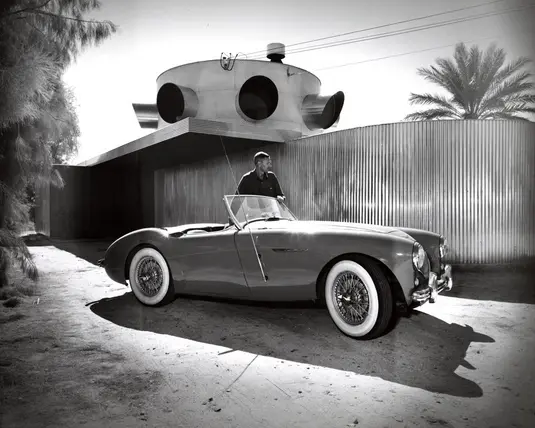 Albert Frey with car in front of Frey House 1, after addition, Palm Springs, Calif., circa 1950.