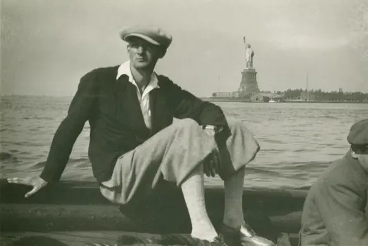 Albert Frey arriving in the United States by boat, with Statue of Liberty in the background, 1930.