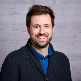 Porträt-Foto von Dr. Christian Badertscher